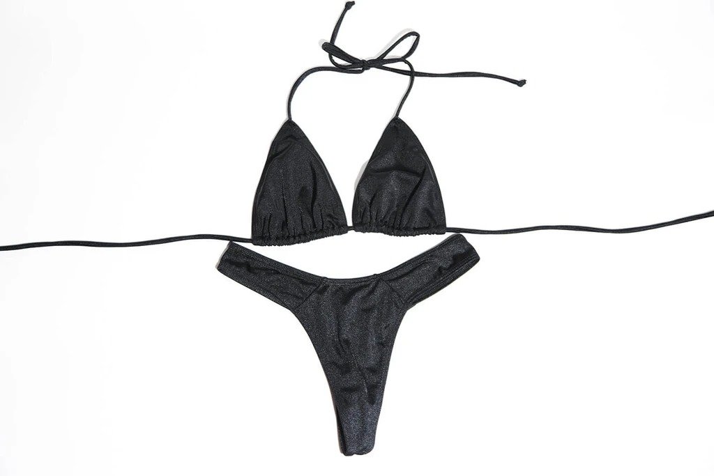 Melody two-piece set showcasing a stylish design with adjustable side strings, perfect for enhancing curves.