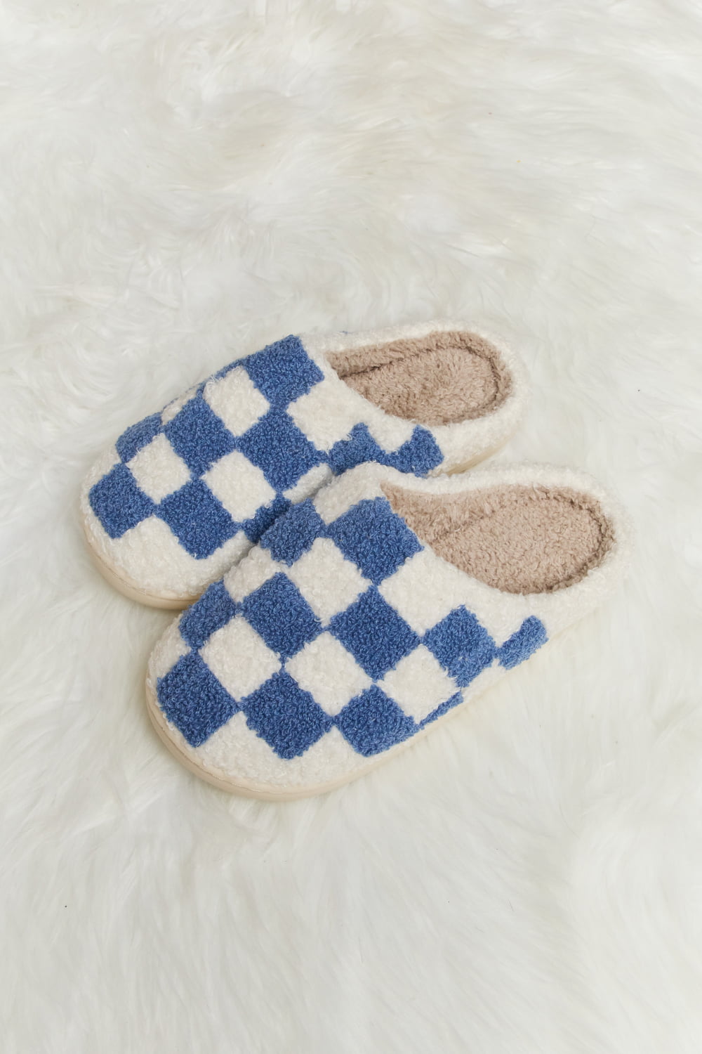 Melody Checkered Print Plush Slide Slippers featuring a cozy faux fur top and durable rubber sole, designed for stylish indoor comfort.