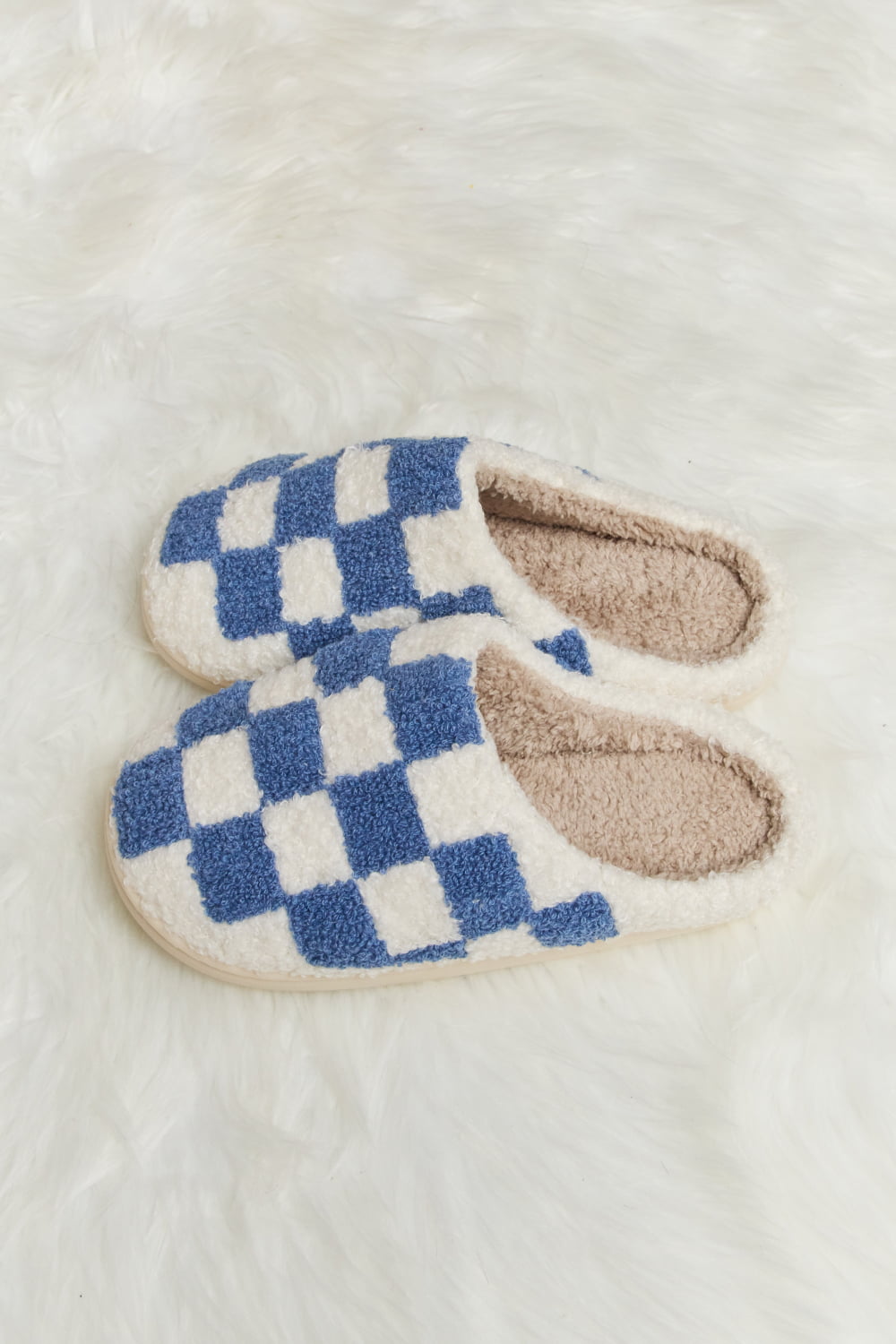 Melody Checkered Print Plush Slide Slippers featuring a cozy faux fur top and durable rubber sole, designed for stylish indoor comfort.