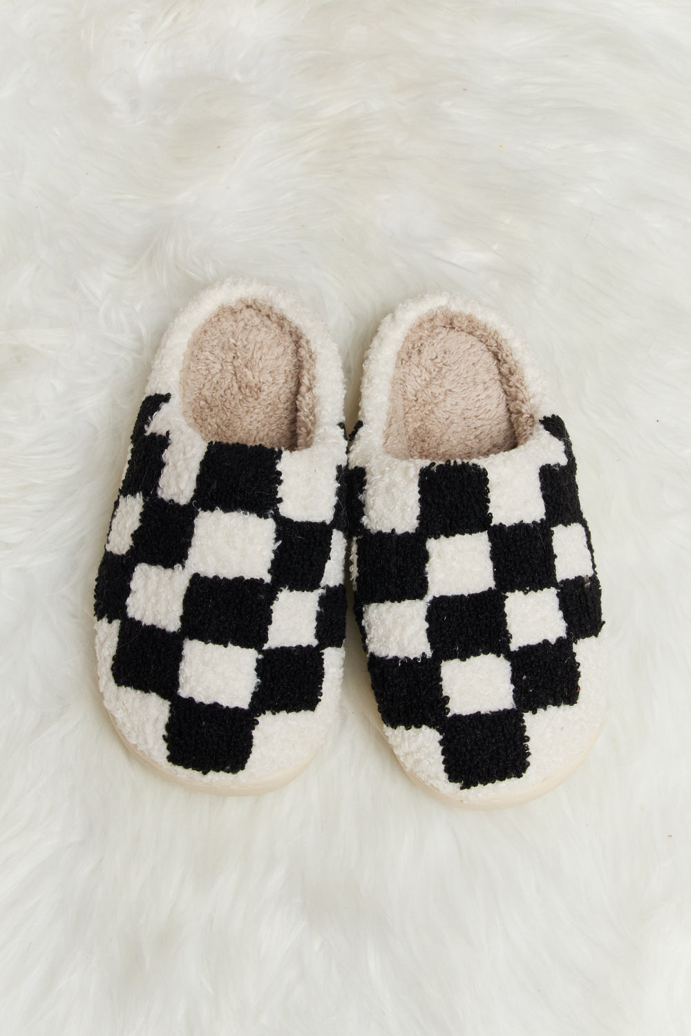 Melody Checkered Print Plush Slide Slippers featuring a cozy faux fur top and durable rubber sole, designed for stylish indoor comfort.