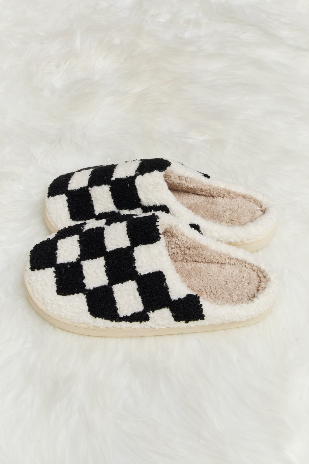 Melody Checkered Print Plush Slide Slippers featuring a cozy faux fur top and durable rubber sole, designed for stylish indoor comfort.