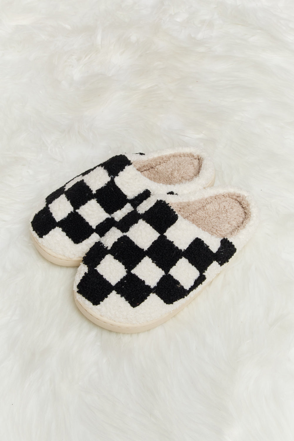 Melody Checkered Print Plush Slide Slippers featuring a cozy faux fur top and durable rubber sole, designed for stylish indoor comfort.