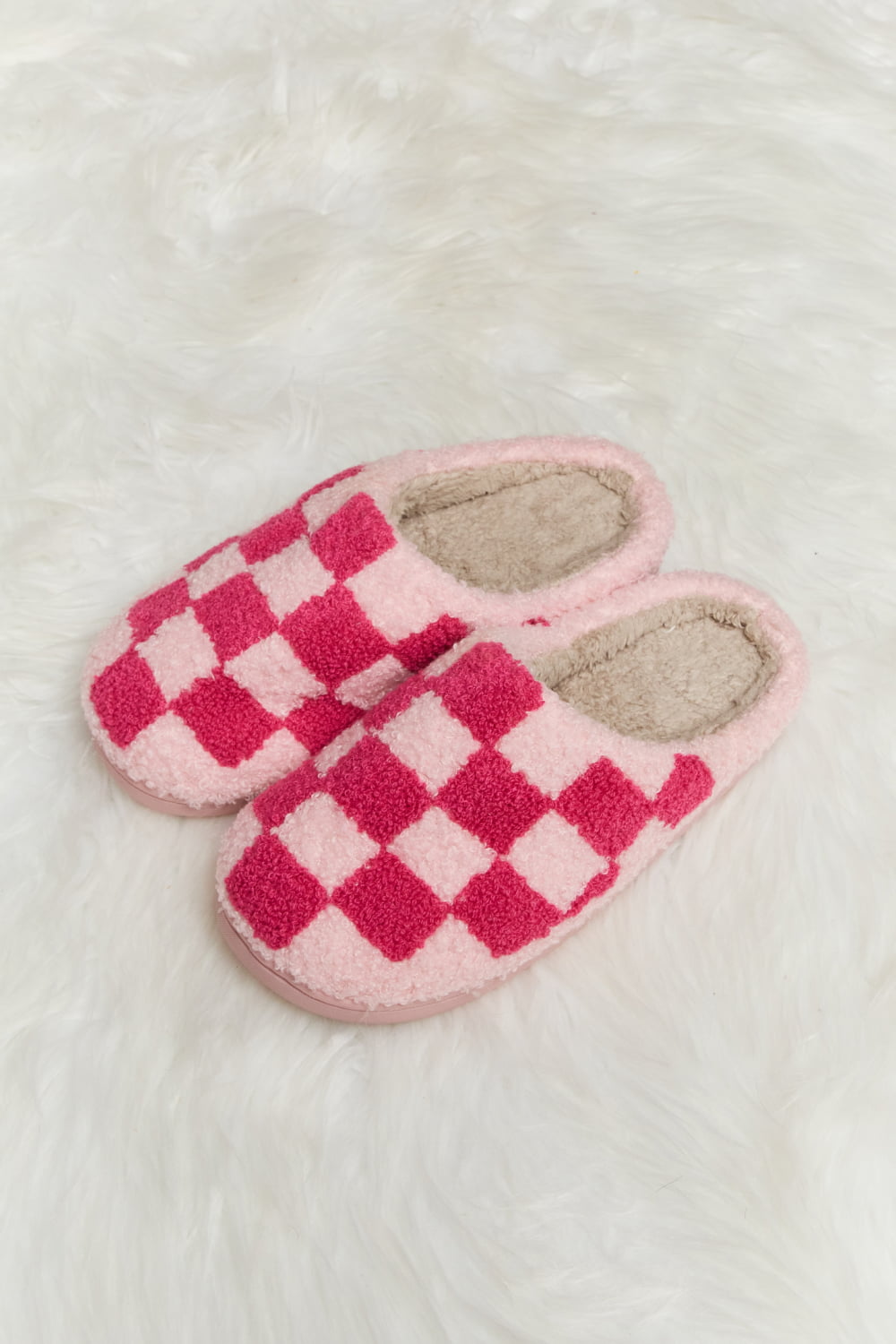 Melody Checkered Print Plush Slide Slippers featuring a cozy faux fur top and durable rubber sole, designed for stylish indoor comfort.