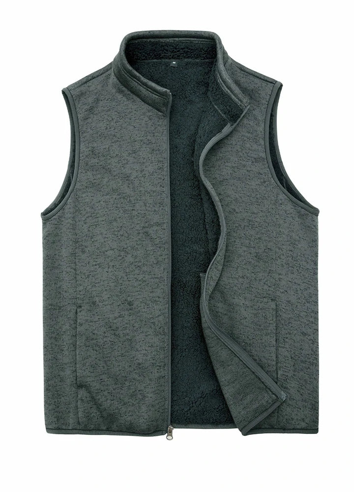 Men's sweater fleece vest with sherpa lining, full-zip closure, and stand-up collar, perfect for winter wear.