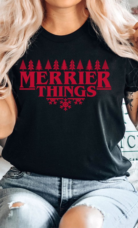 Merrier Things Festive Christmas PLUS Graphic Tee featuring a colorful holiday graphic design on a soft cotton blend fabric.