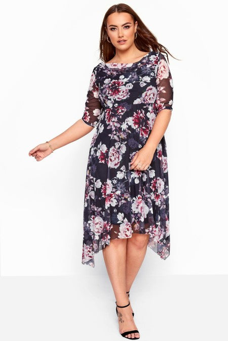 A stylish midi dress featuring short sleeves, a tight upper part, and a loose floral skirt, perfect for summer occasions.