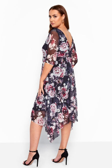 A stylish midi dress featuring short sleeves, a tight upper part, and a loose floral skirt, perfect for summer occasions.