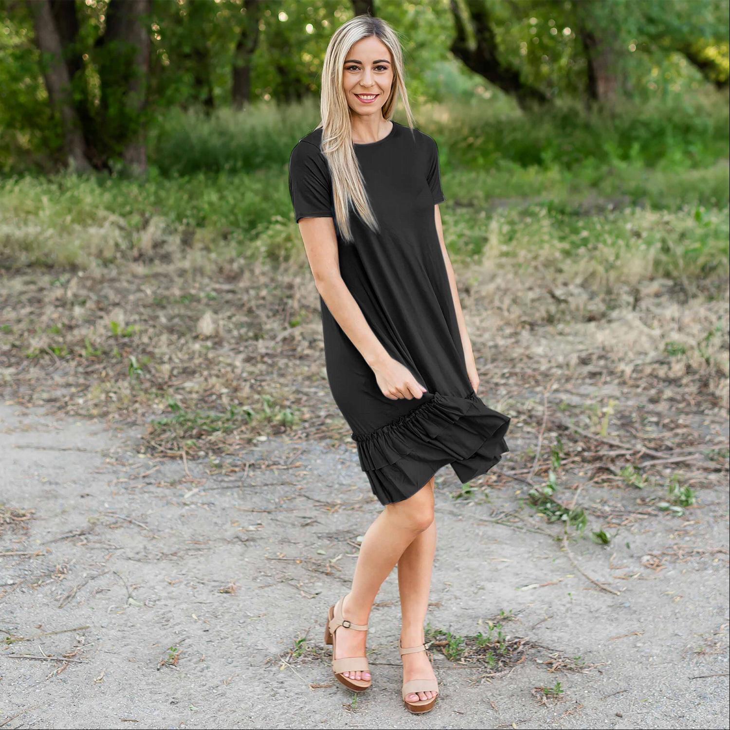 A stylish midi dress featuring short sleeves, cute pocket embellishments, and a ruffled hemline, perfect for any occasion.