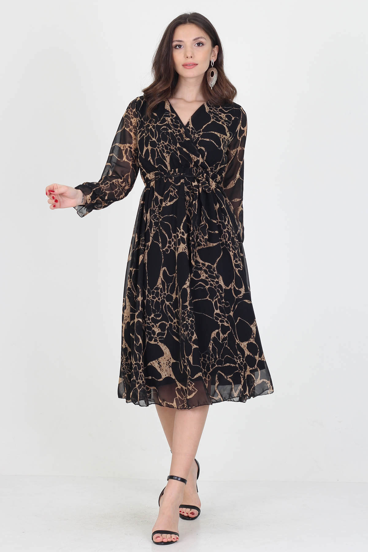 A stylish midi length chiffon dress with a self-tie belt, showcasing its elegant design and lightweight fabric.