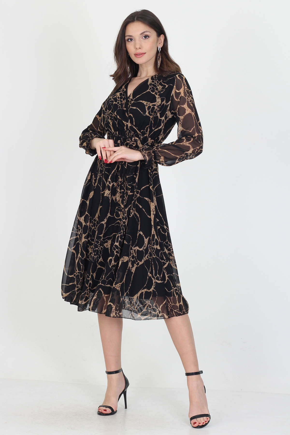 A stylish midi length chiffon dress with a self-tie belt, showcasing its elegant design and lightweight fabric.