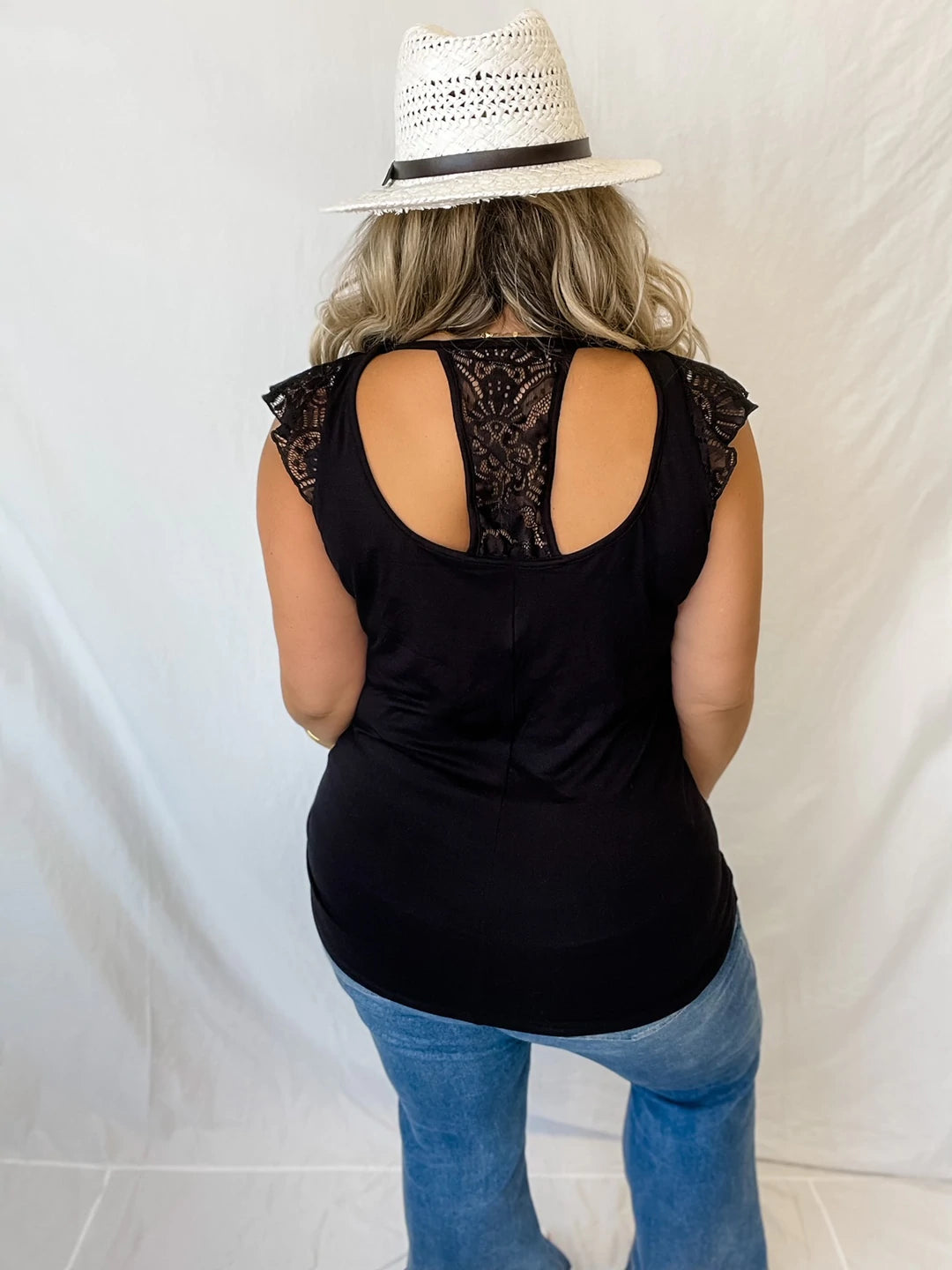 Mila Lace Top featuring elegant lace cap sleeves and a high lace T back design, perfect for stylish occasions.