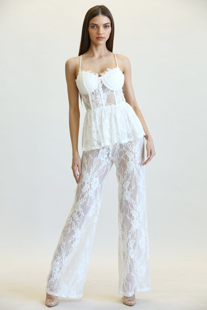 Milania Peplum Waist Jumpsuit featuring stretch lace fabric, scallop lace bustline, and adjustable shoulder straps.