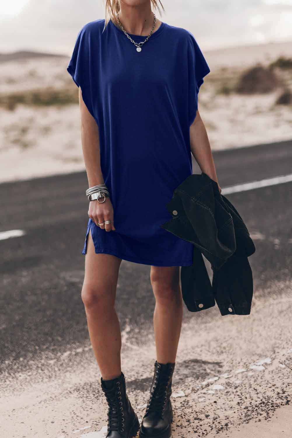 A stylish dark blue mini dress featuring loose sleeves and a round neckline, made from high-quality fabric.