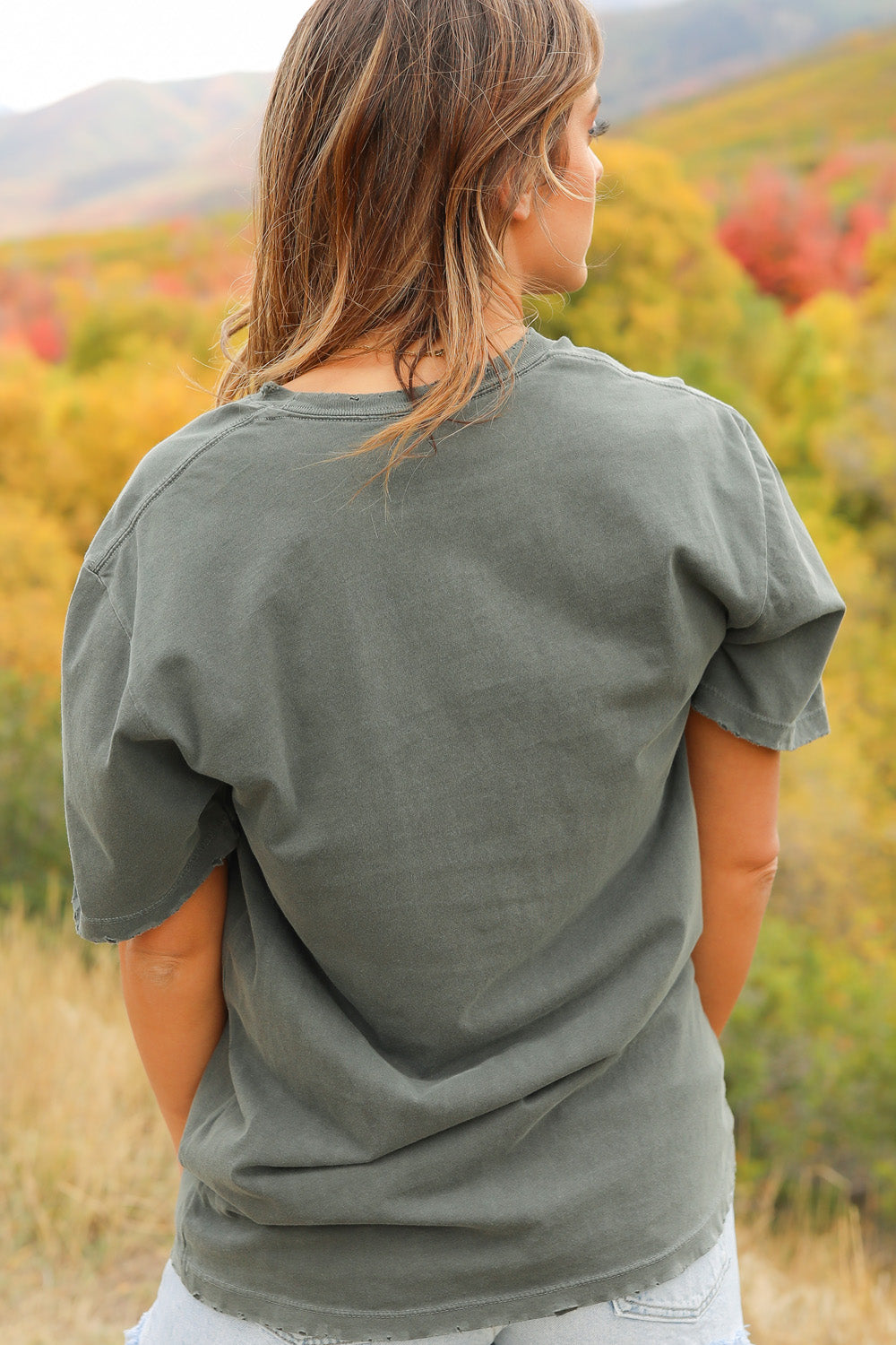 Misfits Distressed Sunkissed Tee in vintage wash black with distressed edges, showcasing a punk style and made from 100% organic cotton.