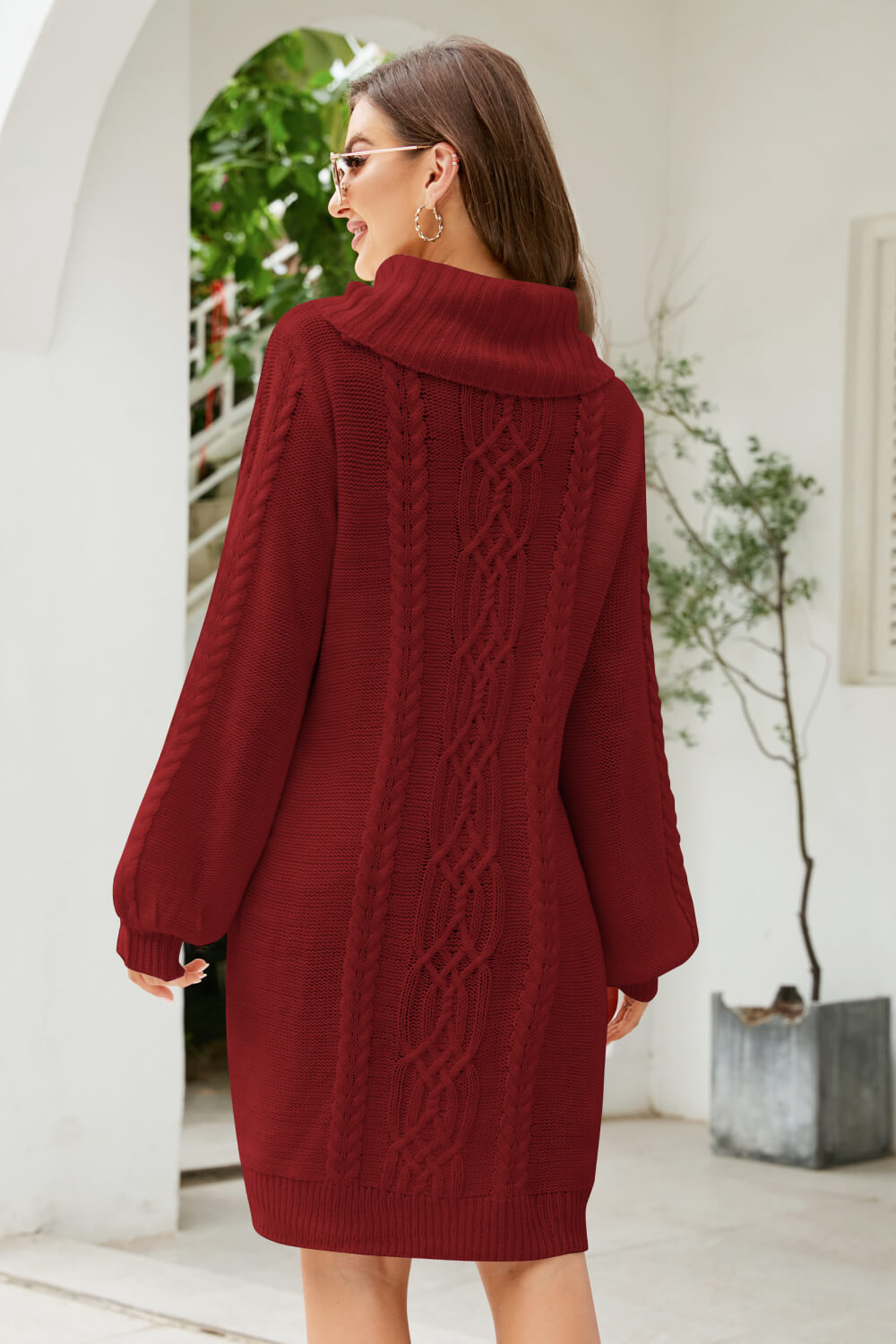 A stylish Mixed Knit Turtleneck Lantern Sleeve Sweater Dress in a solid color, featuring long lantern sleeves and a cozy turtleneck, perfect for casual outings.