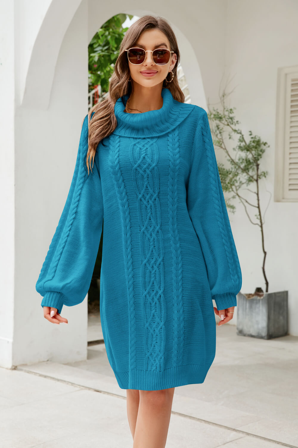 A stylish Mixed Knit Turtleneck Lantern Sleeve Sweater Dress in a solid color, featuring long lantern sleeves and a cozy turtleneck, perfect for casual outings.