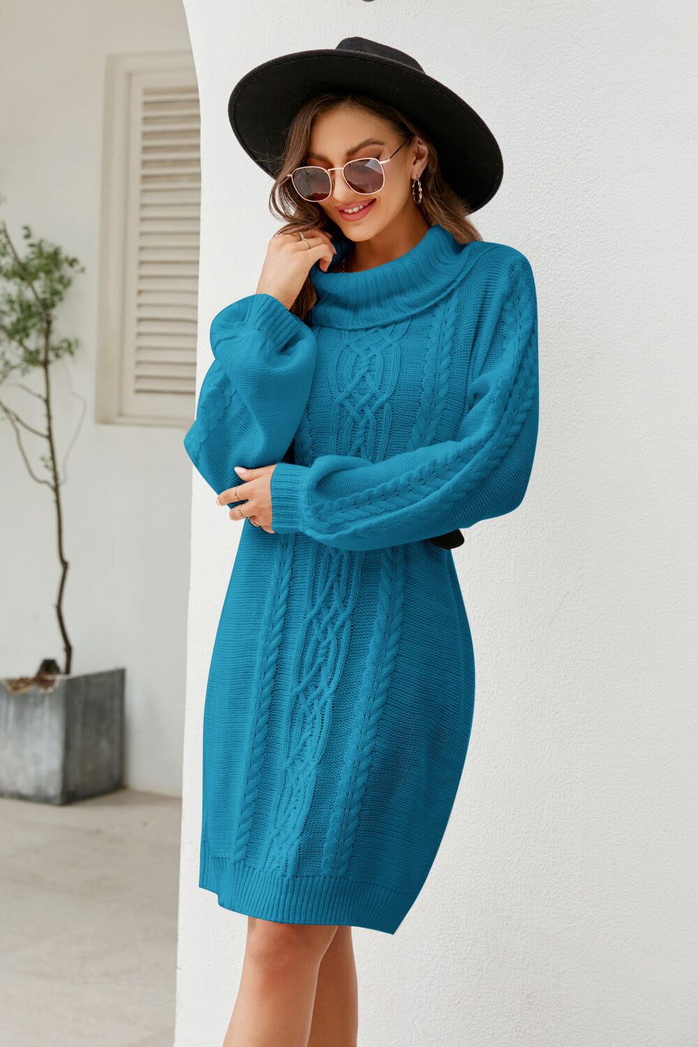 A stylish Mixed Knit Turtleneck Lantern Sleeve Sweater Dress in a solid color, featuring long lantern sleeves and a cozy turtleneck, perfect for casual outings.