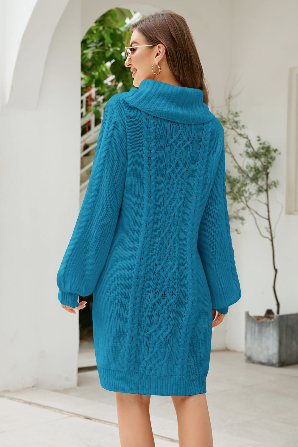 A stylish Mixed Knit Turtleneck Lantern Sleeve Sweater Dress in a solid color, featuring long lantern sleeves and a cozy turtleneck, perfect for casual outings.