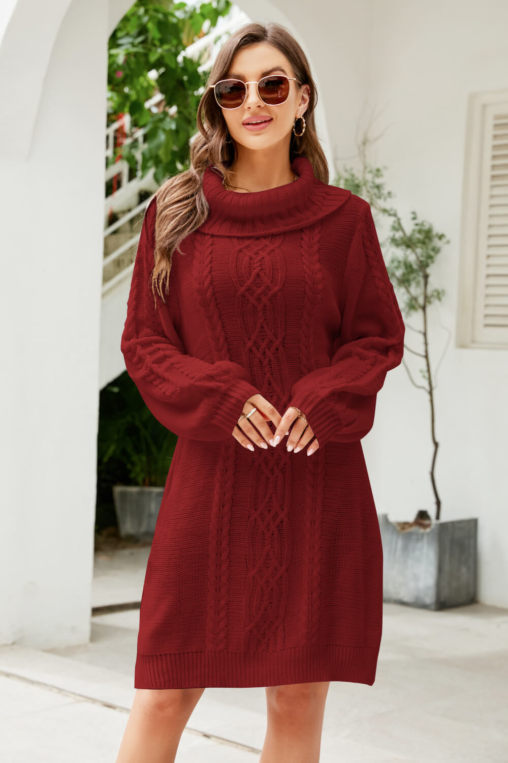 A stylish Mixed Knit Turtleneck Lantern Sleeve Sweater Dress in a solid color, featuring long lantern sleeves and a cozy turtleneck, perfect for casual outings.