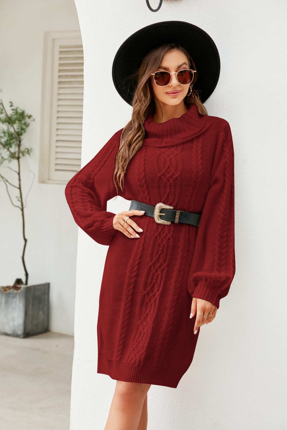 A stylish Mixed Knit Turtleneck Lantern Sleeve Sweater Dress in a solid color, featuring long lantern sleeves and a cozy turtleneck, perfect for casual outings.