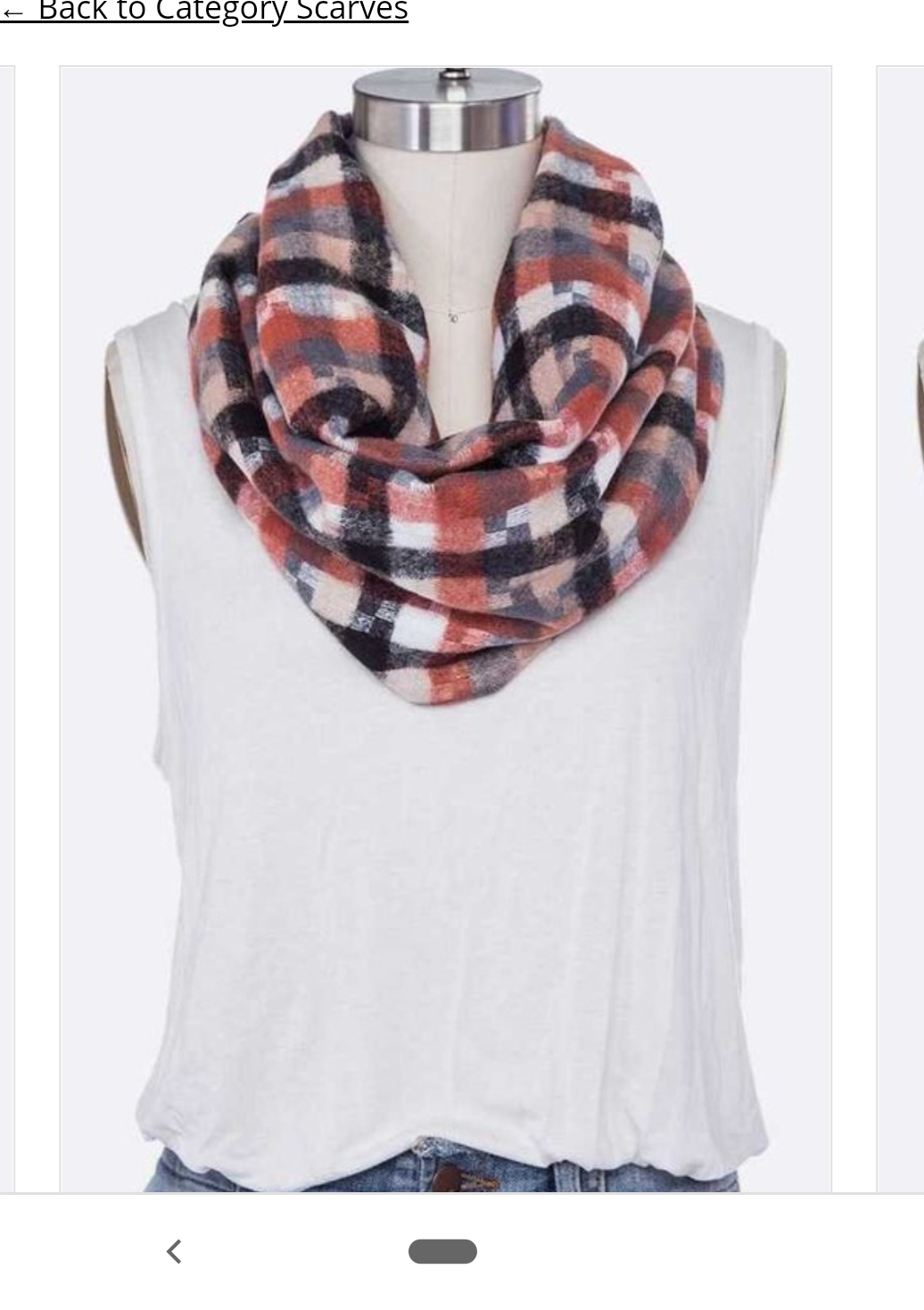 A stylish Mixed Plaid Infinity Scarf featuring vibrant color blocks, perfect for accessorizing any outfit.