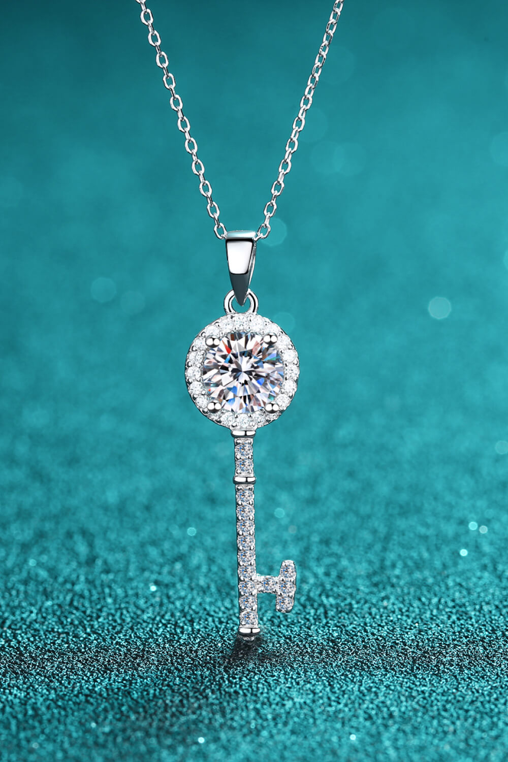 Elegant Moissanite Key Pendant Necklace in 925 sterling silver with rhinestones, showcasing a ghost mannequin style.