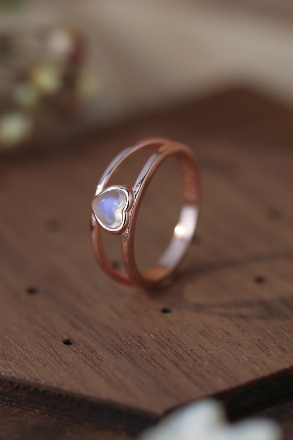 Moonstone Heart 925 Sterling Silver Ring showcasing a natural moonstone with a translucent white and blue-violet hue, set in a modern design.