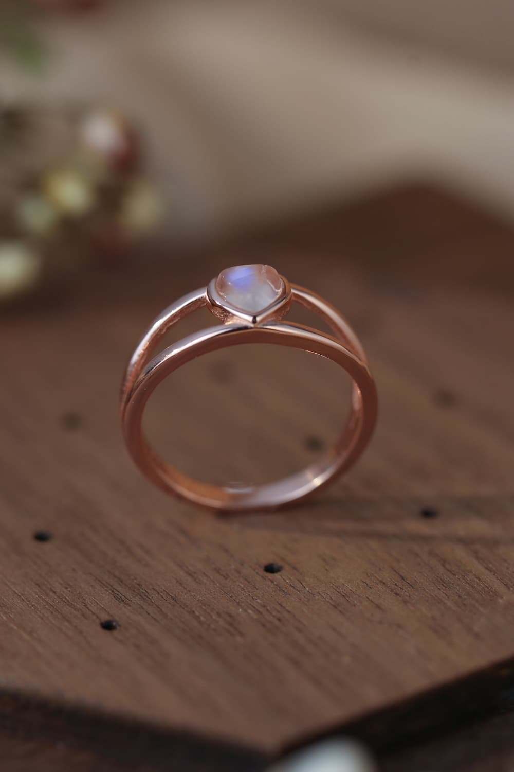 Moonstone Heart 925 Sterling Silver Ring showcasing a natural moonstone with a translucent white and blue-violet hue, set in a modern design.