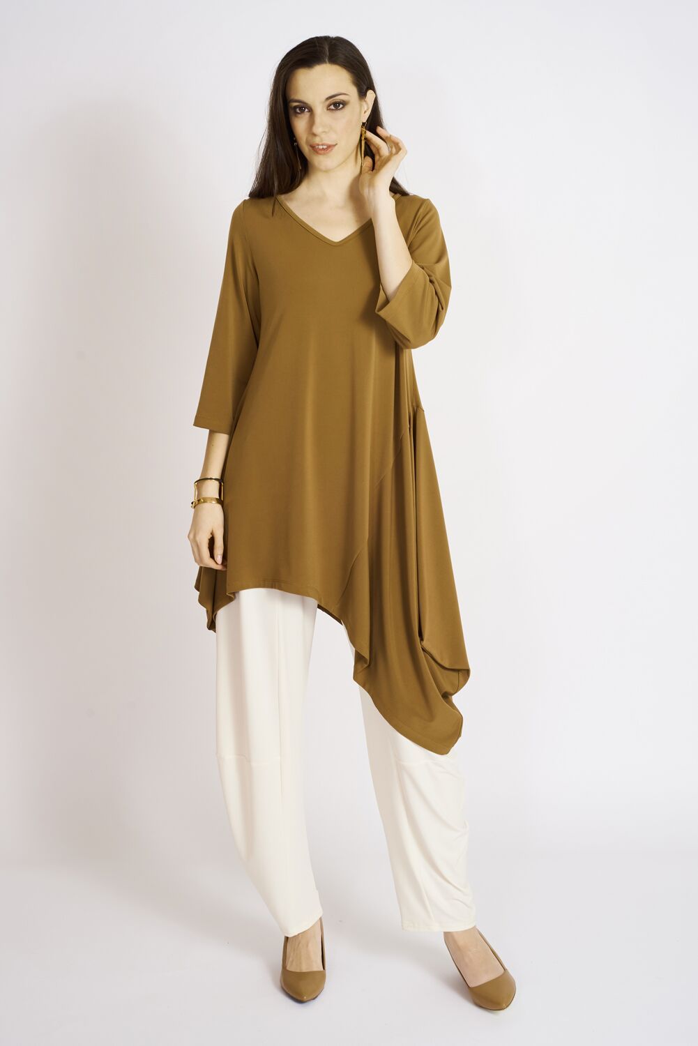 Montana Tunic in various colors, showcasing its flattering fit and luxurious fabric, perfect for fall fashion.