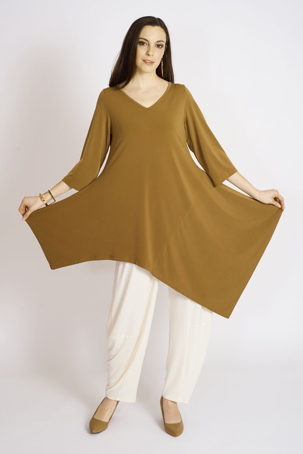 Montana Tunic in various colors, showcasing its flattering fit and luxurious fabric, perfect for fall fashion.