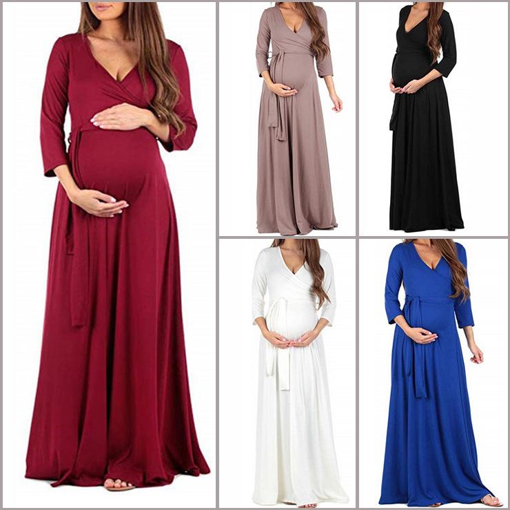 Mopping Dress featuring a deep V-neck, 3/4 sleeves, and a belt, designed for pregnant women in a solid color.