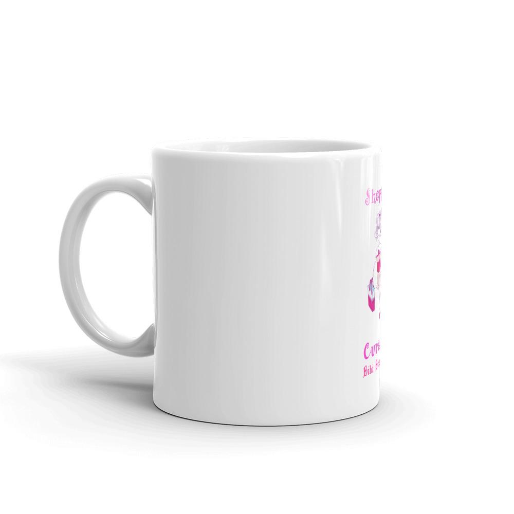 Mug Bibi Because Collection featuring a glossy white finish with the phrase 'Shopping Cures Me' printed in vibrant colors.