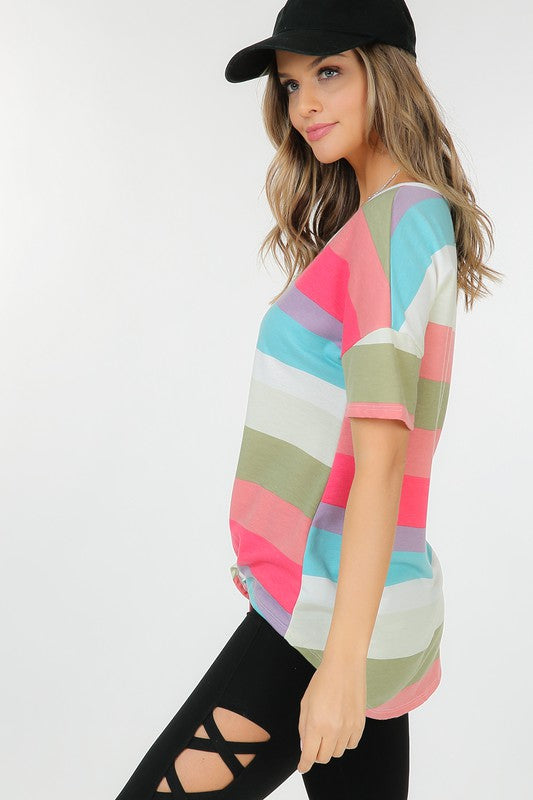 A vibrant multi-color striped short sleeve top with a trendy front tie, showcasing its stylish design and soft fabric.