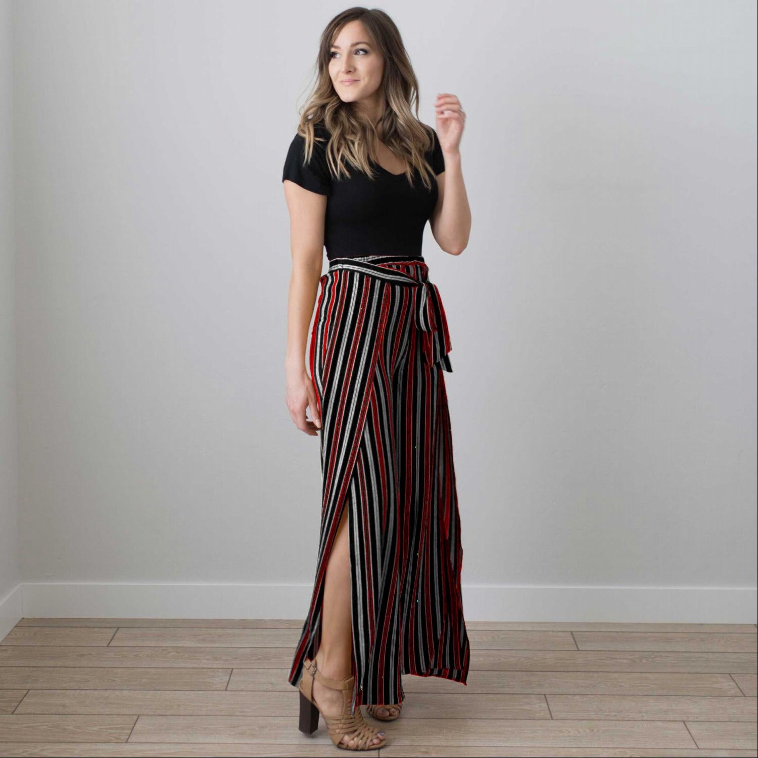 Multi Striped Wrap Pants featuring vertical stripes, a tie front, and a deep side slit, perfect for stylish comfort.