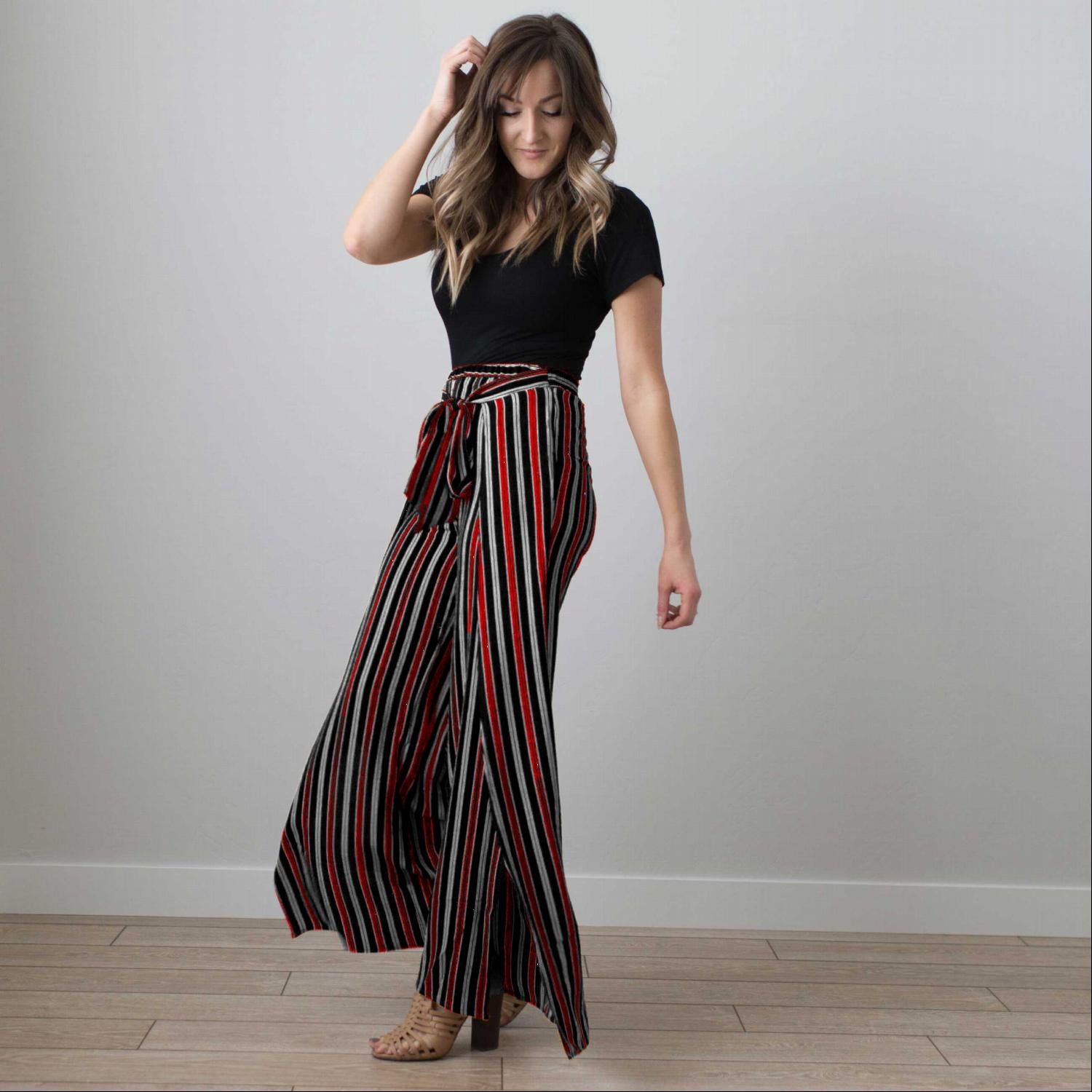 Multi Striped Wrap Pants featuring vertical stripes, a tie front, and a deep side slit, perfect for stylish comfort.