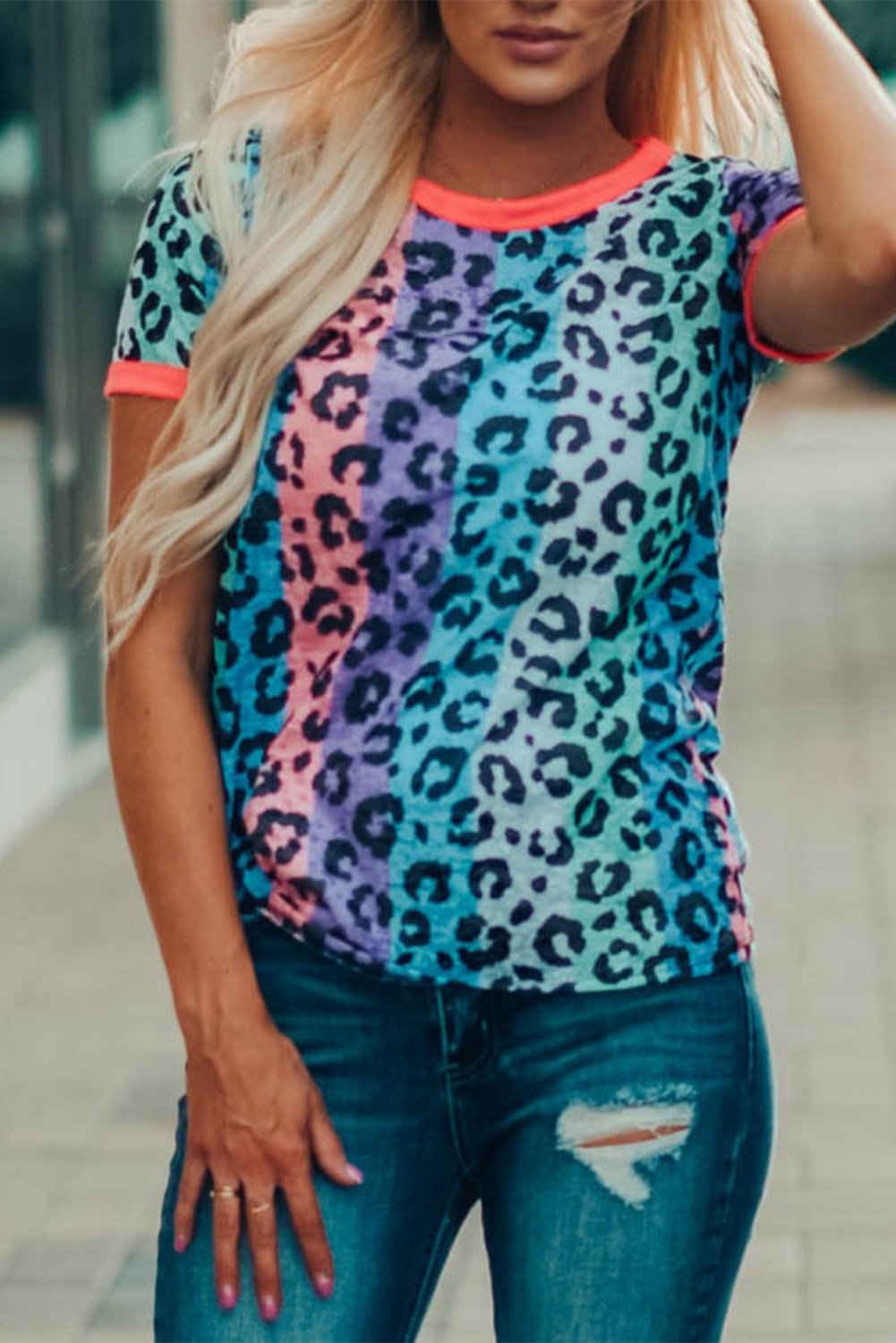 Multicolor Base Leopard T-shirt featuring an all-over leopard print design with a glowing round neckline and sleeve cuffs.