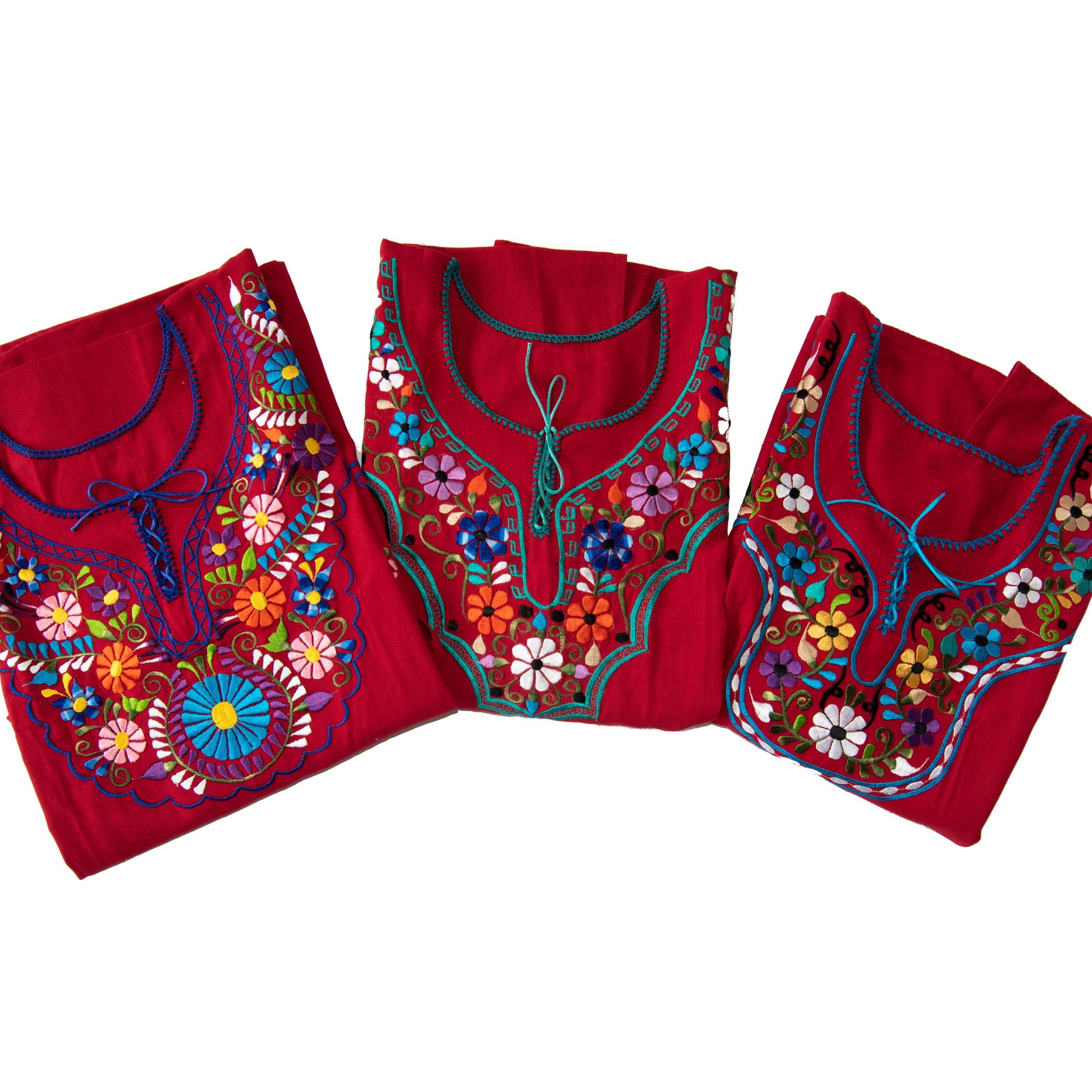 A vibrant Multi-Color Embroidery Mexican Dress featuring intricate floral designs, showcasing the craftsmanship of artisans from Puebla, Mexico.