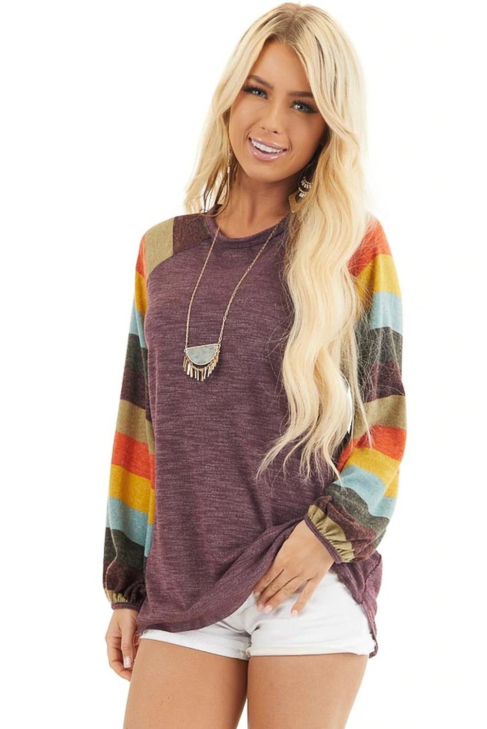 Multicolor striped balloon sleeves green knit top showcasing vibrant colors and trendy design.