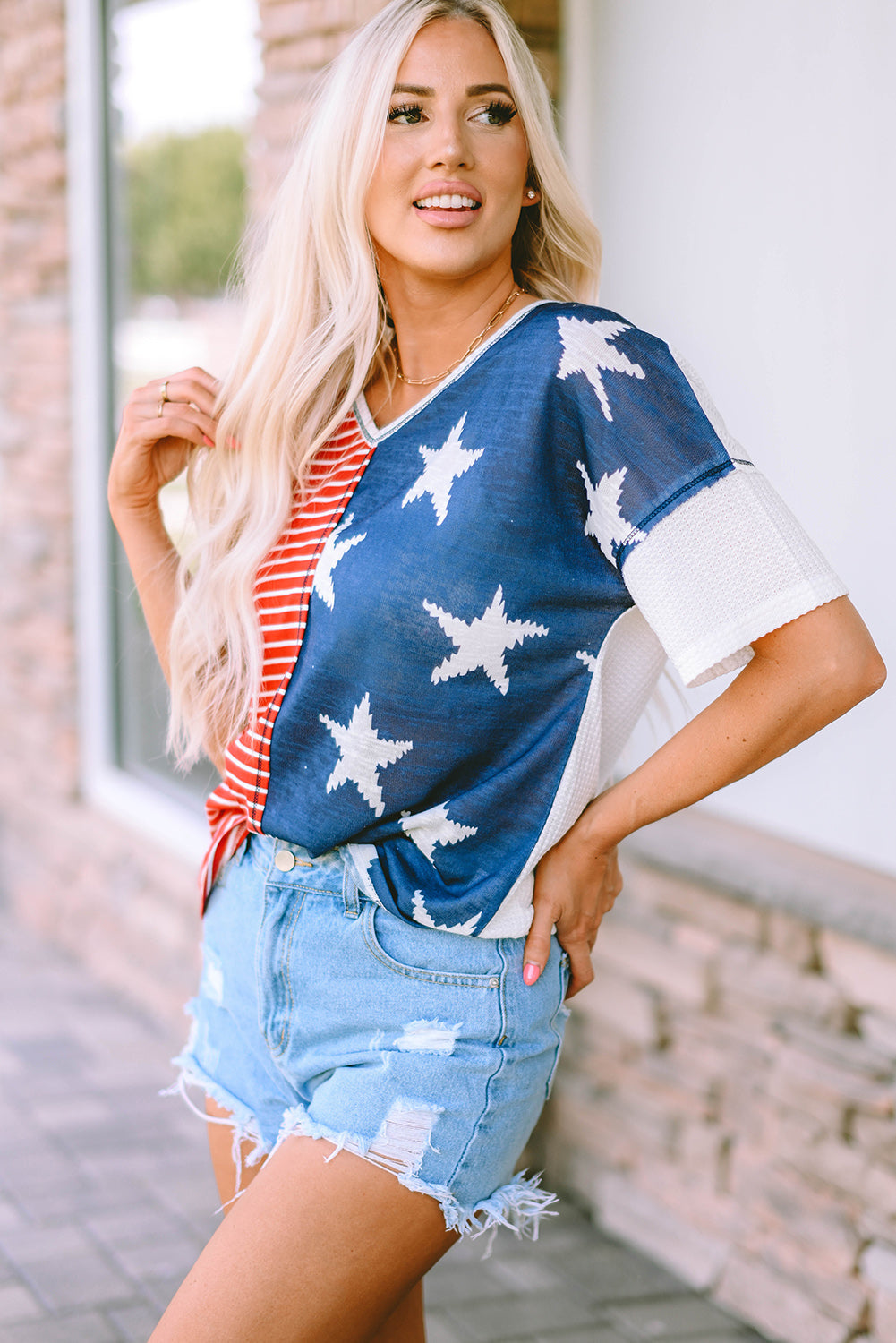 Multicolor Stripes Stars Print Knit Short Sleeves Top featuring bold stripes and star designs, perfect for casual wear.