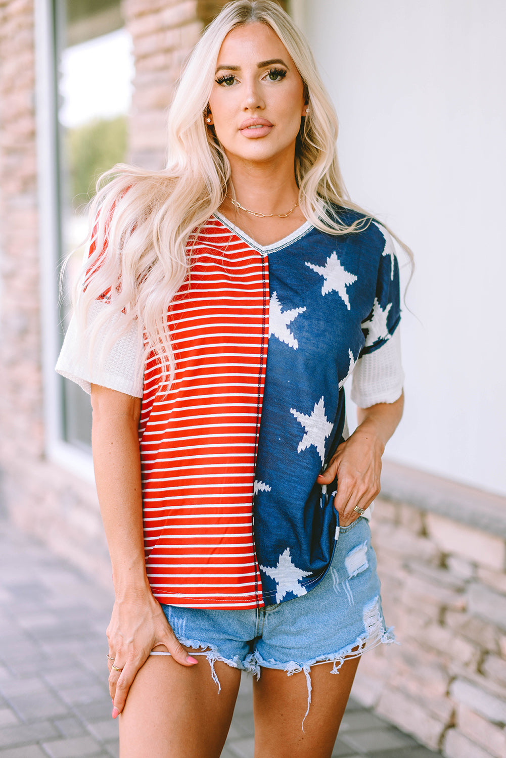 Multicolor Stripes Stars Print Knit Short Sleeves Top featuring bold stripes and star designs, perfect for casual wear.