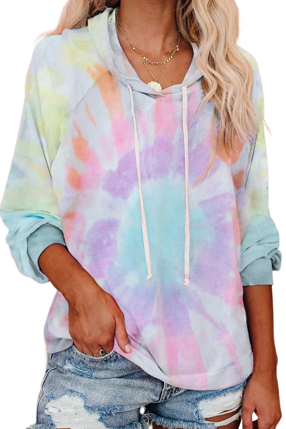 A stylish multicolor tie-dye knit hoodie displayed on a mannequin, showcasing its vibrant colors and relaxed fit.