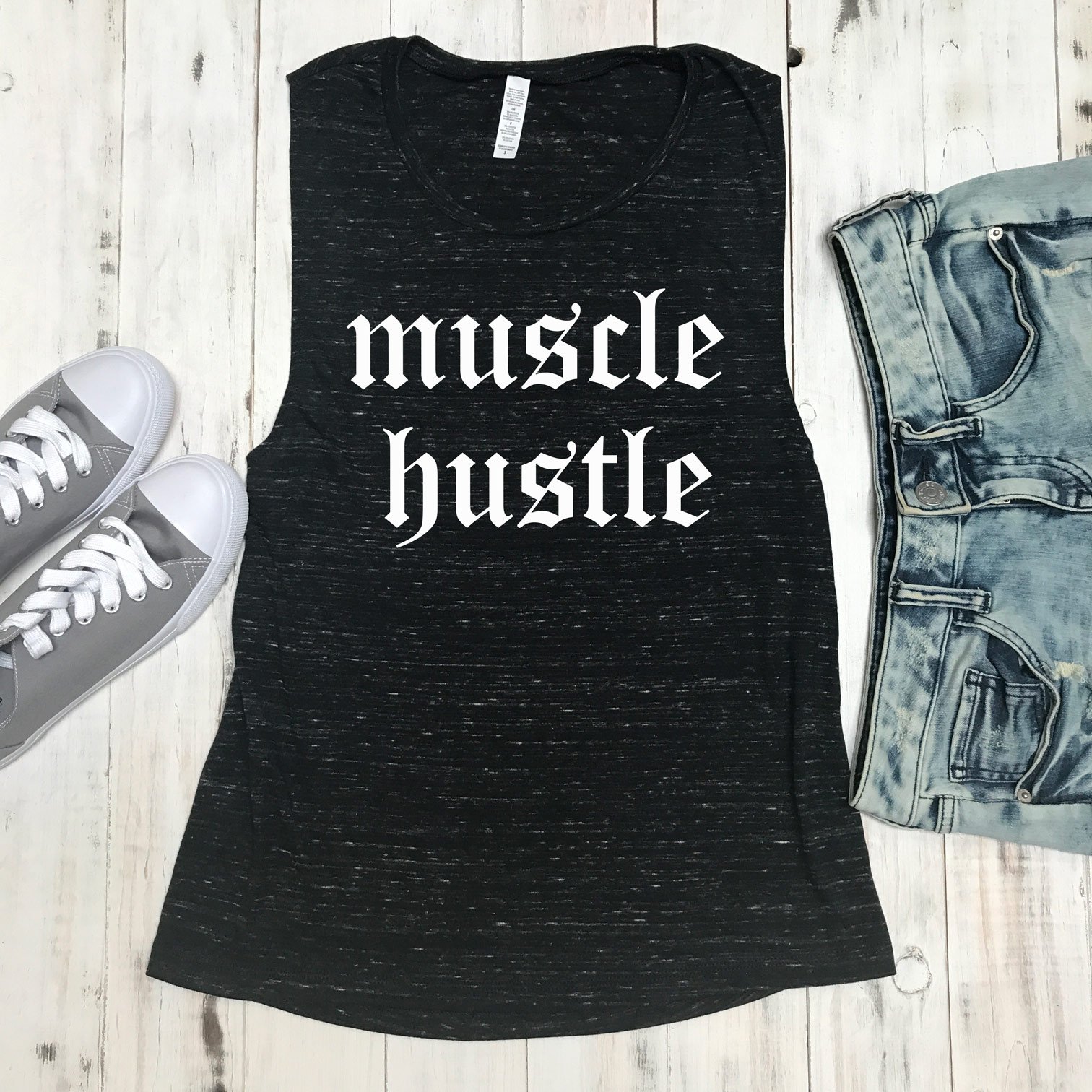 Muscle Hustle Black Marble Muscle Tank Top featuring a stylish black marble design with white print, perfect for workouts.