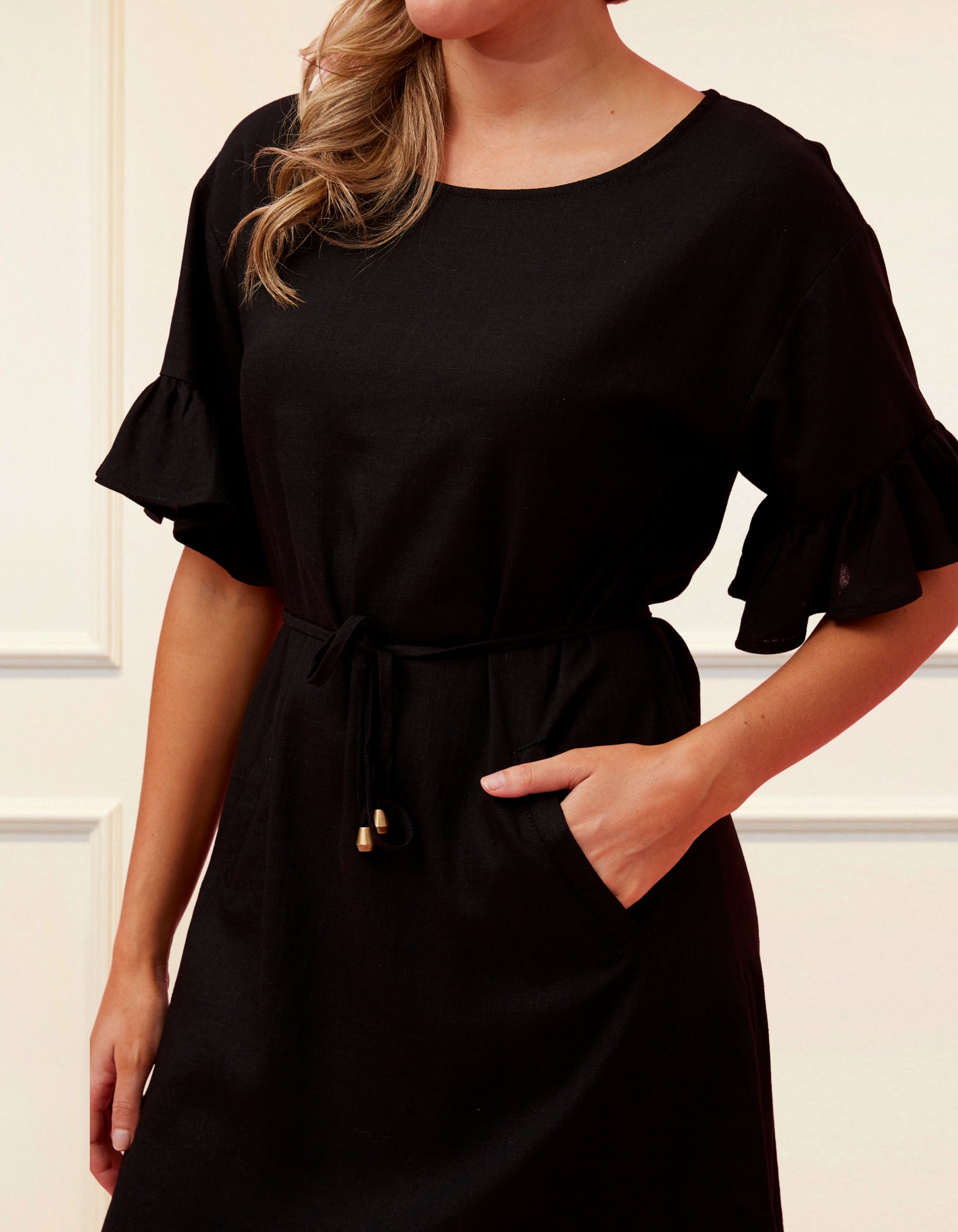 Myriam Dress in solid navy blue, featuring half frill sleeves and a self-tie waist, perfect for casual chic styling.