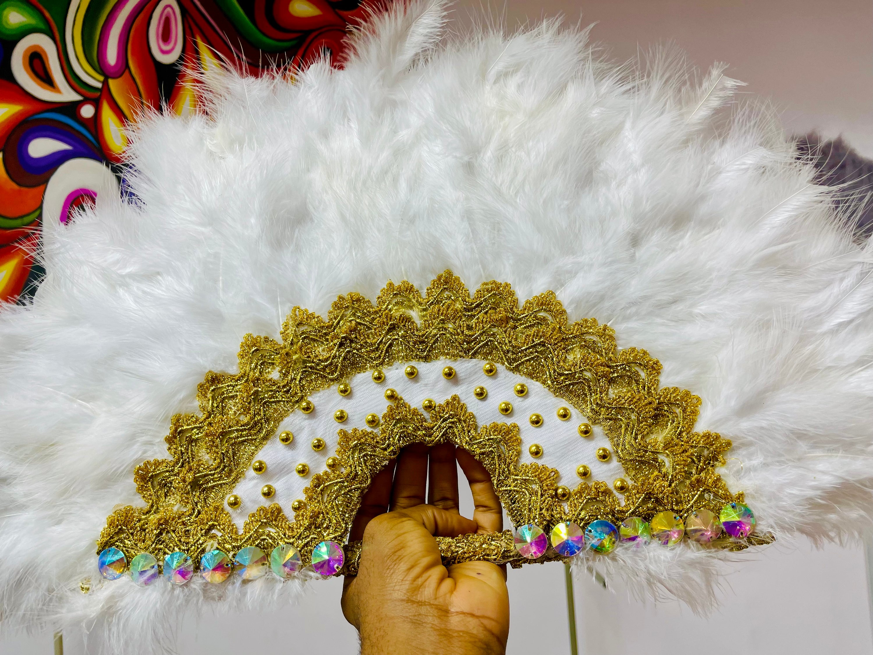 Nadia Dance Fan featuring fluffy feathers, customizable colors, and elegant tassels, perfect for dance performances.