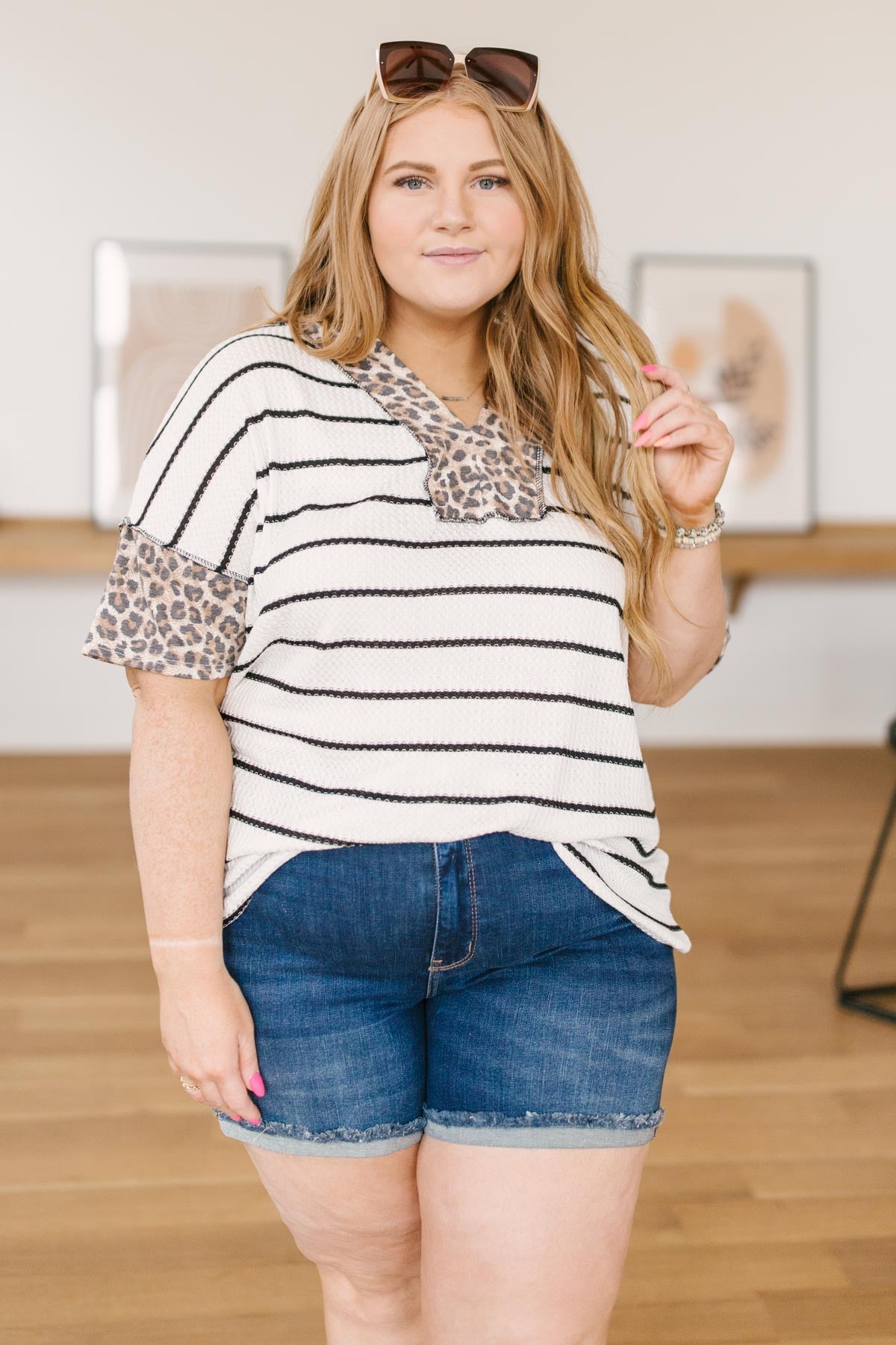 Nautical Jane Top featuring a blend of animal print and stripes, made from lightweight and stretchy waffle knit material.