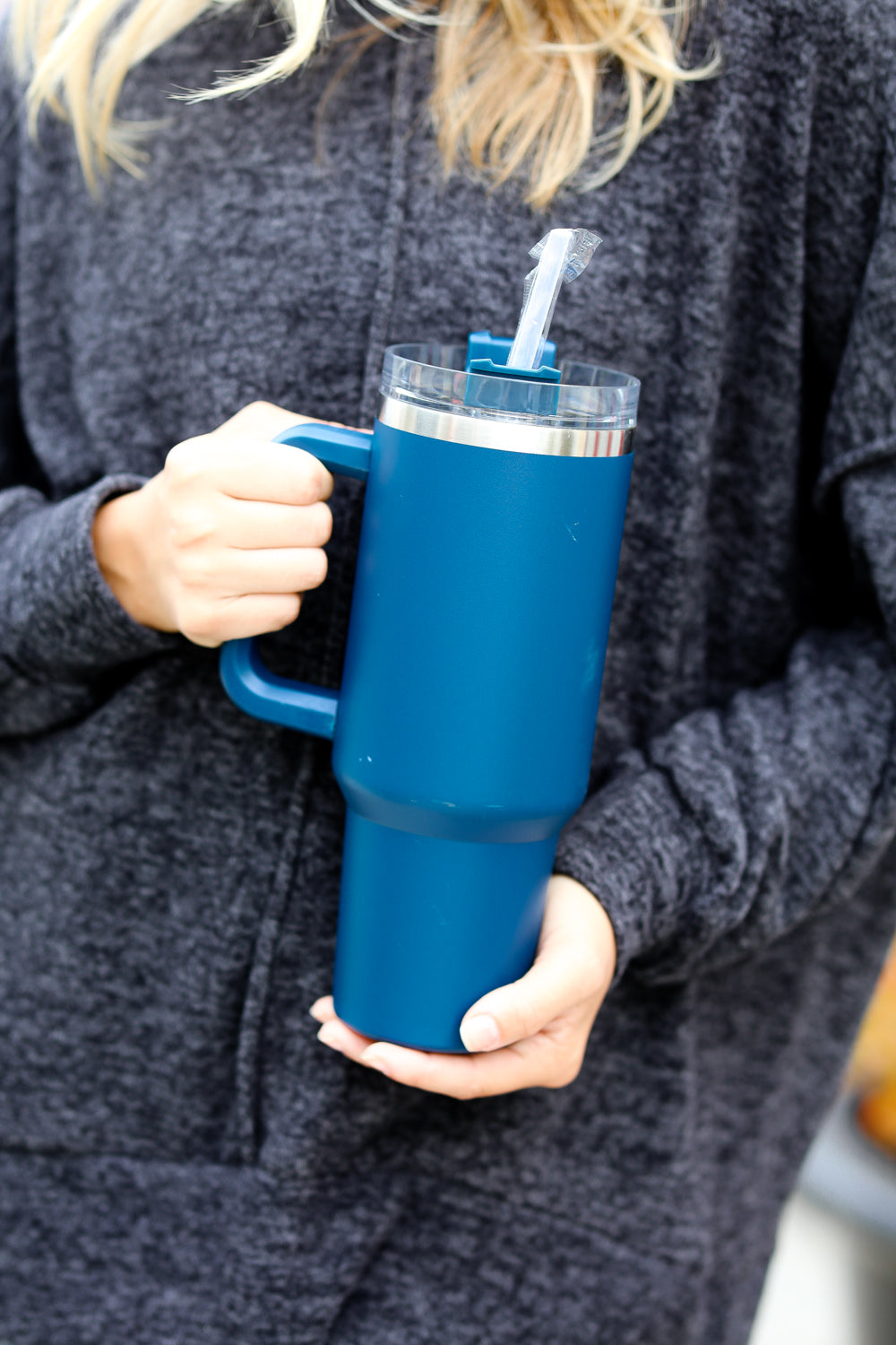 Navy Insulated 38oz. Tumbler with Straw, featuring a handle and spill-proof lid.