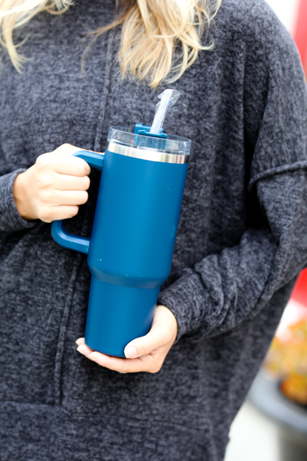 Navy Insulated 38oz. Tumbler with Straw, featuring a handle and spill-proof lid.