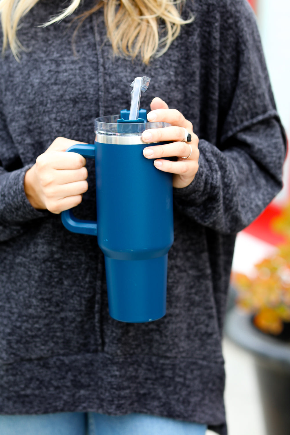 Navy Insulated 38oz. Tumbler with Straw, featuring a handle and spill-proof lid.