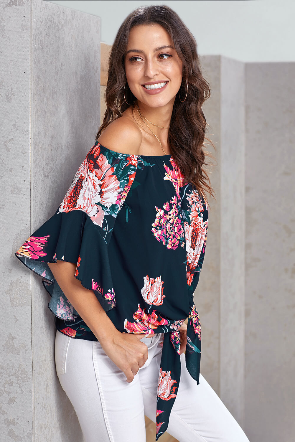 Navy off shoulder floral tie front high low chiffon blouse with 3/4 sleeves, showcasing a stylish and elegant design.