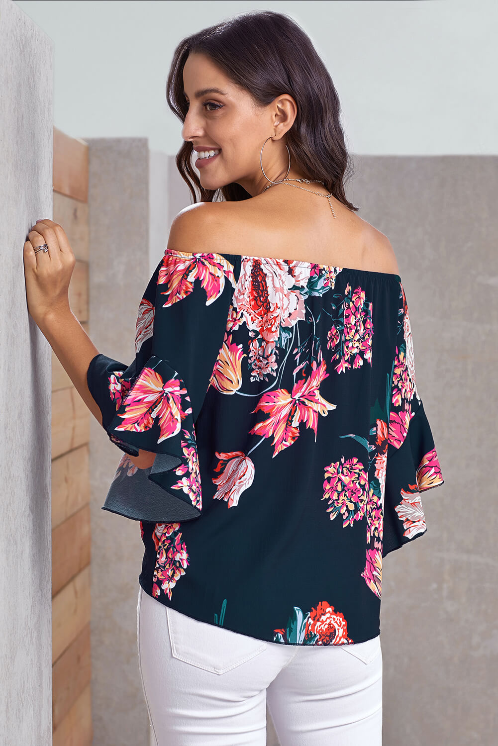 Navy off shoulder floral tie front high low chiffon blouse with 3/4 sleeves, showcasing a stylish and elegant design.